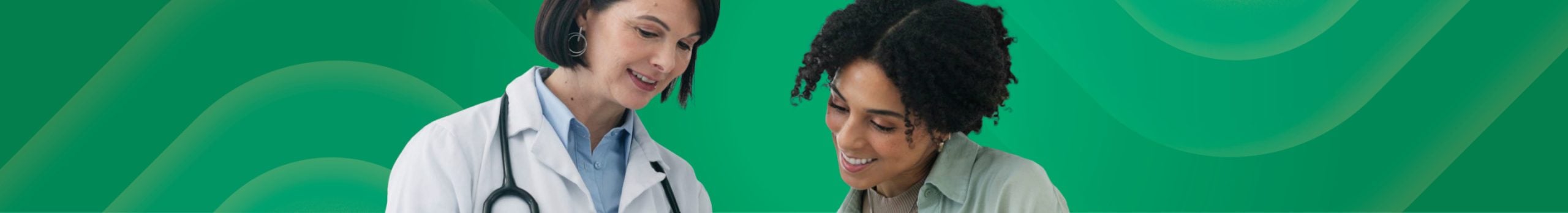 Female doctor providing help and support to her female patient.